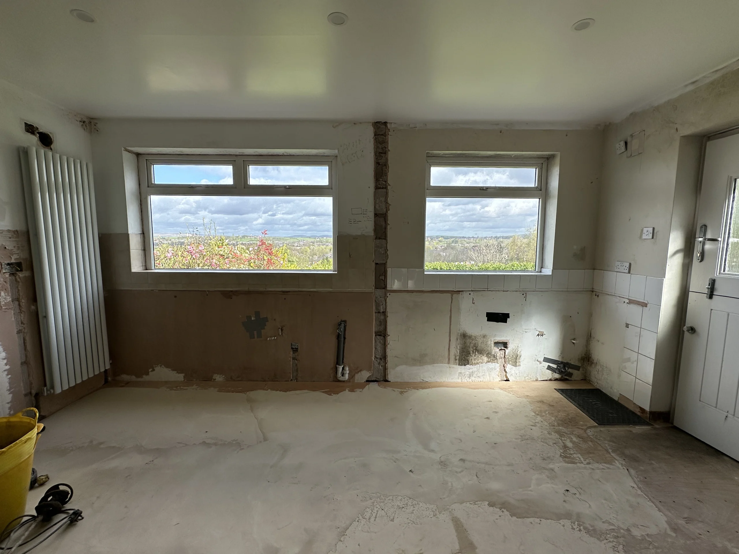 Rear elevation before structural opening works and bifold door installation in Oldham