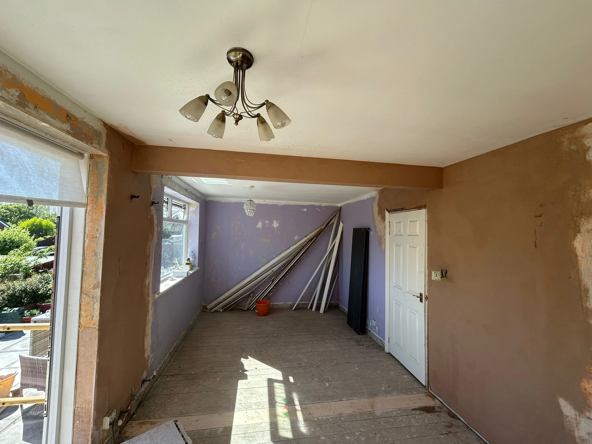 Load-bearing wall removal in Halewood Avenue WA3 showing open-plan structural alteration during works by Guardian Structural Ltd