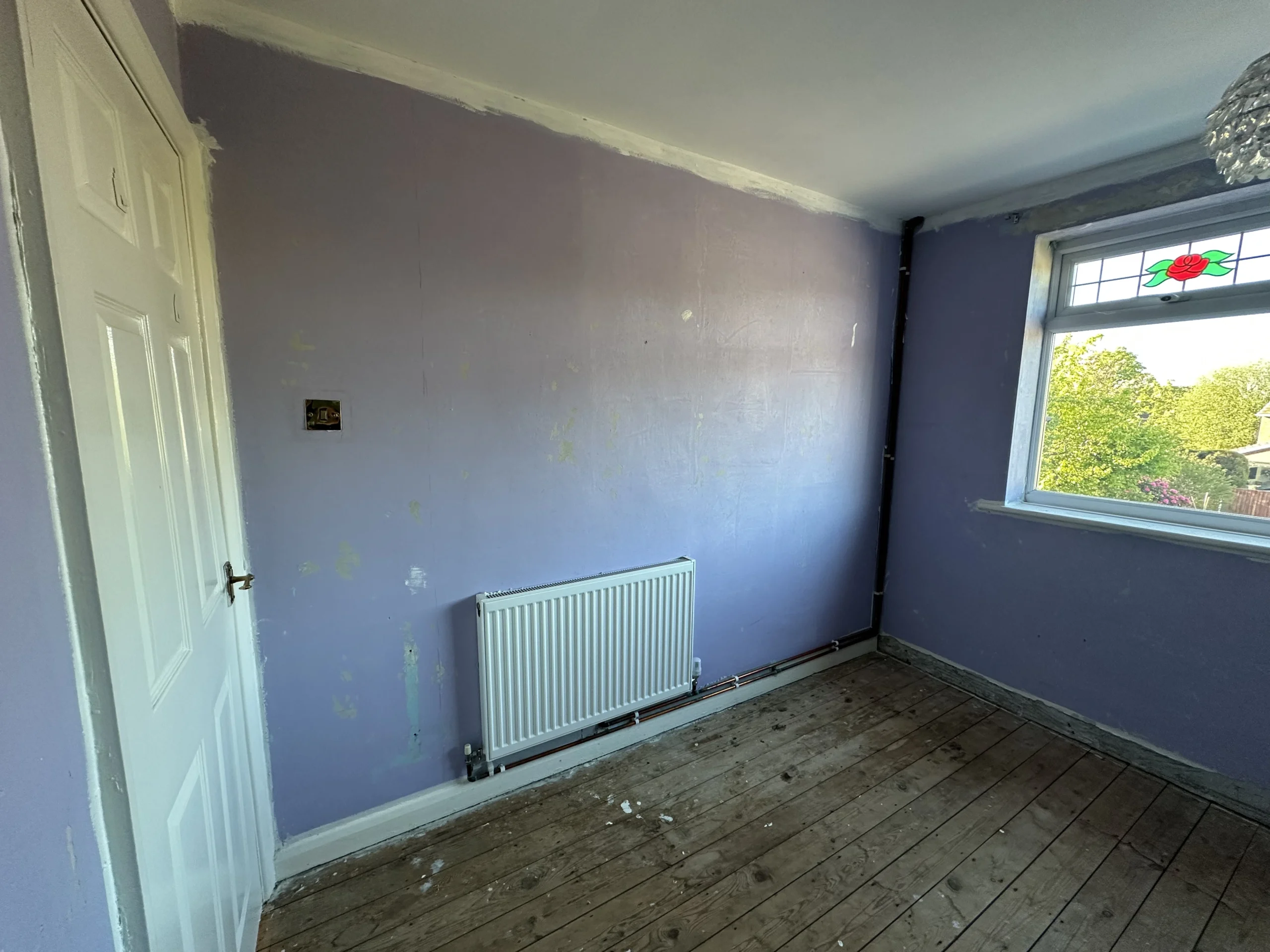 Room before structural wall removal showing existing layout in Halewood Avenue WA3